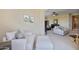 Spacious living room offers ample seating, an open floor plan, and modern decor, perfect for relaxation at 18432 W Port Royale Ln, Surprise, AZ 85388