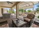 Relaxing outdoor patio with a fireplace and a BBQ, perfect for hosting gatherings and enjoying the outdoors at 18634 N Paloma Ct, Surprise, AZ 85387