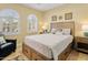 Comfortable bedroom with charming windows, warm colors, and a cozy atmosphere for relaxation at 18634 N Paloma Ct, Surprise, AZ 85387