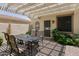 Charming outdoor patio with a decorative pergola, perfect for alfresco dining and entertaining guests at 18634 N Paloma Ct, Surprise, AZ 85387