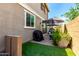 Clean backyard with a patio and built-in grill at 1882 S Jesse Pl, Chandler, AZ 85286