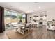 Open dining area with backyard access, seamlessly connected to the kitchen and living spaces at 1882 S Jesse Pl, Chandler, AZ 85286