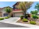 Lovely home with a two-car garage, nice landscaping, and a welcoming driveway for easy access at 1882 S Jesse Pl, Chandler, AZ 85286