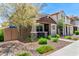 Charming home with tidy front yard and covered porch offering an inviting curb appeal at 1882 S Jesse Pl, Chandler, AZ 85286