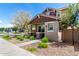Charming two-story home with a welcoming front porch and well-maintained landscaping at 1882 S Jesse Pl, Chandler, AZ 85286