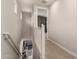 Upstairs hallway leading to various rooms, showcasing the home's layout and design with carpet flooring at 1882 S Jesse Pl, Chandler, AZ 85286