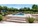 Inviting hot tub area with lounge seating surrounded by manicured landscaping offers a relaxing escape at 1882 S Jesse Pl, Chandler, AZ 85286