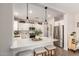 Bright and modern kitchen boasts an island with seating and stainless steel appliances at 1882 S Jesse Pl, Chandler, AZ 85286