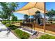 Shaded playground area with slides and climbing structures offers a safe and enjoyable space for children at 1882 S Jesse Pl, Chandler, AZ 85286