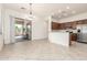 Open concept kitchen with stainless steel appliances and a connected dining area at 1887 W Periwinkle Way, Chandler, AZ 85248