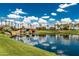 Scenic view of a pond and lush green landscape, highlighting the community's natural beauty at 1887 W Periwinkle Way, Chandler, AZ 85248