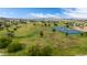 Expansive aerial view of a park featuring sports courts, green spaces, and mountain views at 19013 N 18Th Ave, Phoenix, AZ 85027