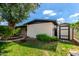 Green backyard featuring attractive landscape, a shed, and room to roam at 19013 N 18Th Ave, Phoenix, AZ 85027