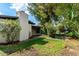 Charming backyard with mature trees, lush vegetation, and a cozy outdoor retreat at 19013 N 18Th Ave, Phoenix, AZ 85027