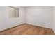 Cozy bedroom features light hardwood floors and natural light at 19013 N 18Th Ave, Phoenix, AZ 85027