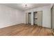 Bedroom featuring closet space and modern light fixture at 19013 N 18Th Ave, Phoenix, AZ 85027