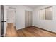 Bright bedroom featuring modern floors, neutral tones, and a closet for ample storage at 19013 N 18Th Ave, Phoenix, AZ 85027