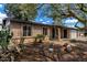 Charming home with brick facade, desert landscaping, and a private entrance at 19013 N 18Th Ave, Phoenix, AZ 85027