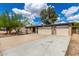 Street view of single-story brick home with desert landscaping, a two-car garage, and a private entrance at 19013 N 18Th Ave, Phoenix, AZ 85027