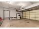Spacious garage with laundry area and potential for ample storage or workshop space at 19013 N 18Th Ave, Phoenix, AZ 85027