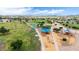 Aerial view of community playground with several different play structures and picnic area at 19013 N 18Th Ave, Phoenix, AZ 85027