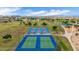 Areal view of community tennis courts and playground with picturesque mountain backdrop at 19013 N 18Th Ave, Phoenix, AZ 85027