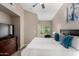 Comfortable bedroom with a king-size bed, neutral colors, and plenty of natural light, perfect for relaxation at 1920 E Bell Rd # 1189, Phoenix, AZ 85022
