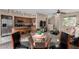Open-concept dining area with seating, a modern kitchen, and inviting living space at 1920 E Bell Rd # 1189, Phoenix, AZ 85022