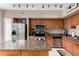 Modern kitchen with stainless steel appliances, granite countertops, and ample cabinet space, offering both style and functionality at 1920 E Bell Rd # 1189, Phoenix, AZ 85022