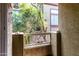Peaceful outdoor patio area with a view of green trees at 1920 E Bell Rd # 1189, Phoenix, AZ 85022