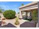 A covered patio and backyard provide a private outdoor retreat at 19530 N 84Th Ave, Peoria, AZ 85382