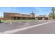 Beautiful building exterior featuring well-maintained landscaping and covered walkways at 19530 N 84Th Ave, Peoria, AZ 85382
