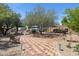 Reflection Garden featuring brick paths, trees, and seating areas, offering a serene outdoor space at 19530 N 84Th Ave, Peoria, AZ 85382