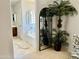 Bathroom featuring a large tub, decorative mirror, and an elegant design at 21873 W Pima St, Buckeye, AZ 85326