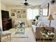 Cozy living room featuring a comfortable sofa, glass coffee table, and decorative accents at 21873 W Pima St, Buckeye, AZ 85326