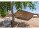 Backyard featuring gravel landscaping and shade at 2223 S Hughes Dr, Buckeye, AZ 85326