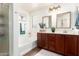 Bathroom boasts double sink vanity, ample counter space, and a soaking tub at 2223 S Hughes Dr, Buckeye, AZ 85326
