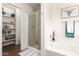 Clean bathroom with a stand up shower and a soaking tub at 2223 S Hughes Dr, Buckeye, AZ 85326