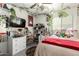 Charming bedroom featuring a vanity, plush decor, and natural elements at 2223 S Hughes Dr, Buckeye, AZ 85326