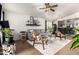 Cozy living room with modern decor, tile floors, and an open layout at 2223 S Hughes Dr, Buckeye, AZ 85326