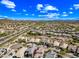 Expansive aerial view of a well-designed community with mountain views and beautiful landscaping at 2315 W Duane Ln, Phoenix, AZ 85085