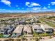 Serene aerial view of a Primary-planned community with desert landscaping and mountain views at 2315 W Duane Ln, Phoenix, AZ 85085