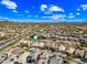 Expansive aerial view of a well-designed community with mountain views and beautiful landscaping at 2315 W Duane Ln, Phoenix, AZ 85085