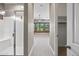 En Suite bathroom showcasing a glass-enclosed shower and a pass-through to the spacious bedroom at 2315 W Duane Ln, Phoenix, AZ 85085