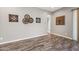 Bedroom showcasing wood-look floors, neutral paint, and decorative wall art and decor at 2315 W Duane Ln, Phoenix, AZ 85085