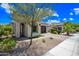 Charming home featuring desert landscaping, an arched entryway, and a two-car garage at 2315 W Duane Ln, Phoenix, AZ 85085