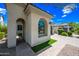 Charming home featuring desert landscaping, an arched entryway, and a two-car garage at 2315 W Duane Ln, Phoenix, AZ 85085