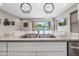 Kitchen features a large center island with seating and modern stainless steel appliances at 2315 W Duane Ln, Phoenix, AZ 85085