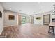 Spacious living area featuring wood floors, and sliding glass doors at 2315 W Duane Ln, Phoenix, AZ 85085