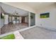 Covered patio featuring brick flooring and sliding glass doors opening to a gourmet kitchen and living area at 2315 W Duane Ln, Phoenix, AZ 85085